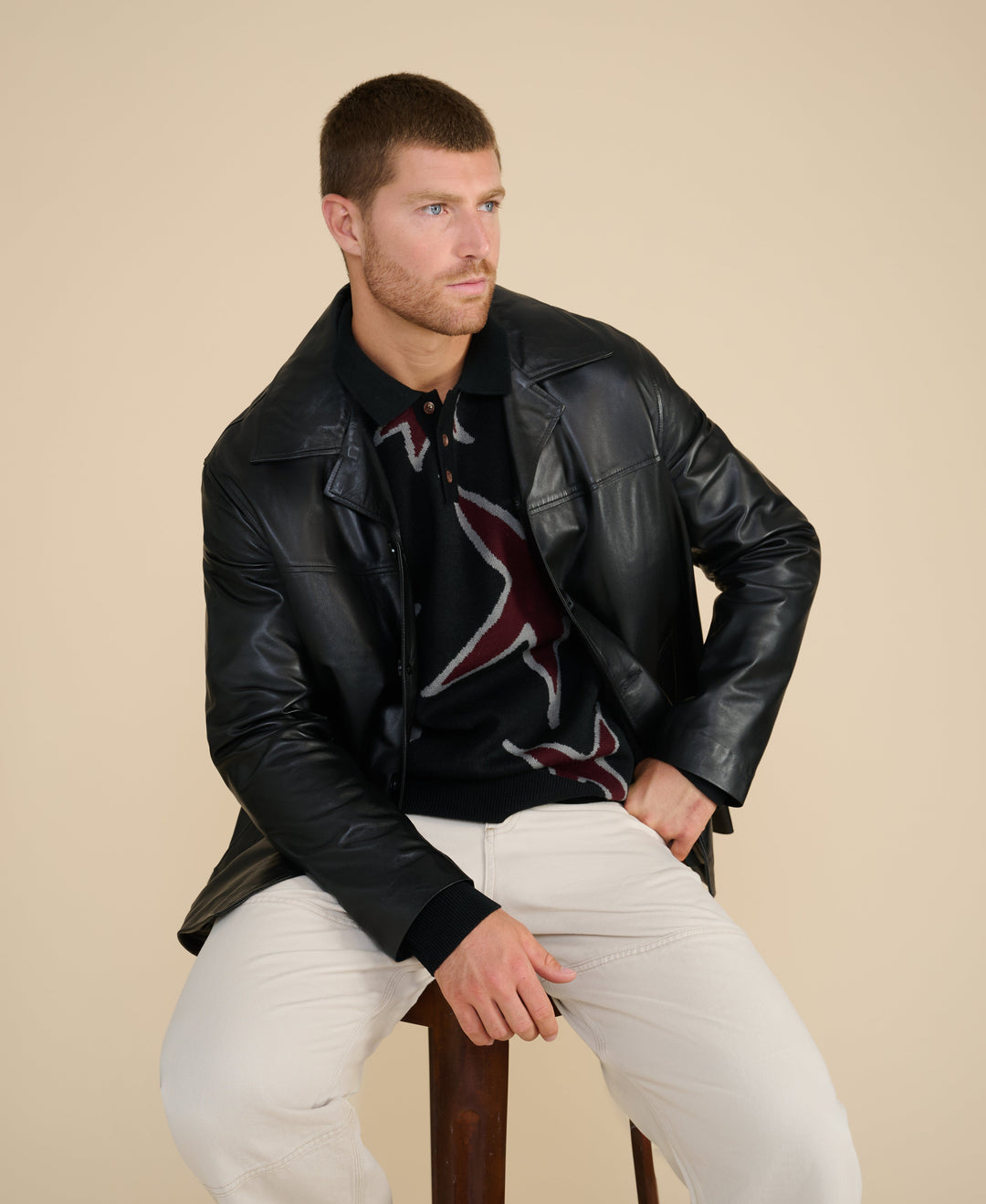 Male model wearing black leather blazer