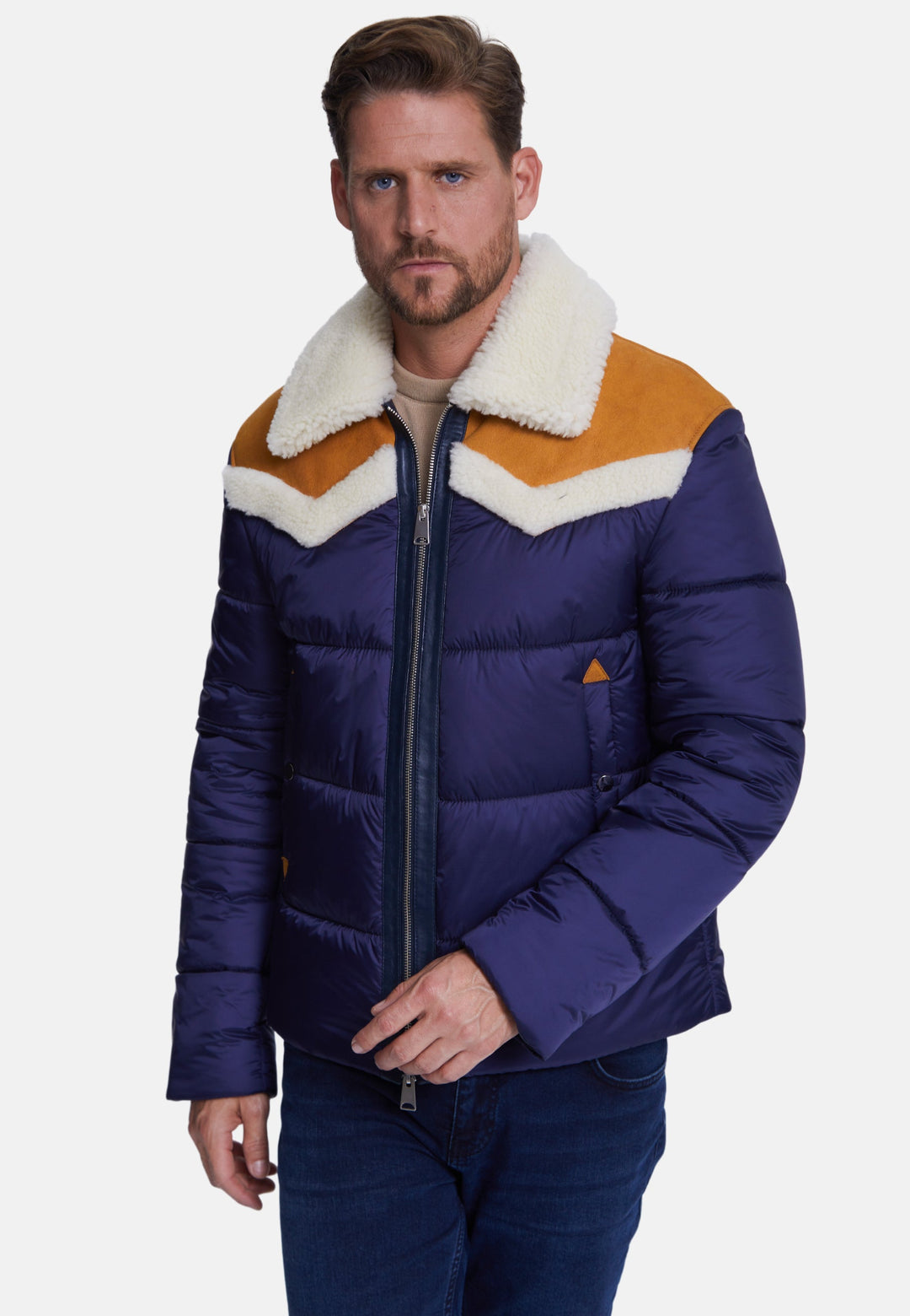 Man wearing navy puffer coat with sherpa collar