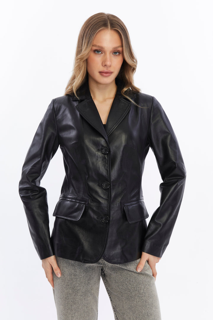 Woman wearing black leather blazer