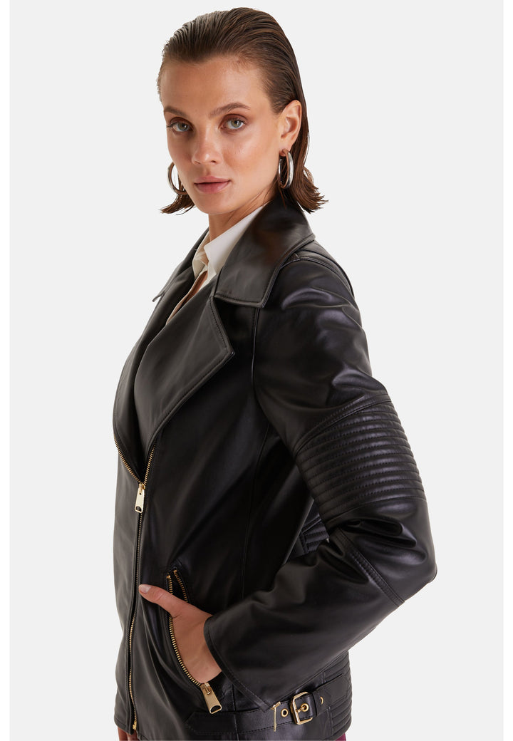 Woman wearing black leather biker jacket