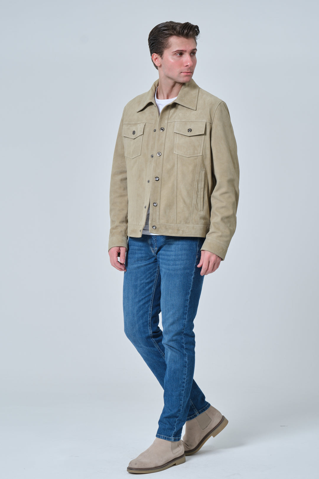 Angled front view of Enzo men's sage green suede jacket in 100% British premium suede