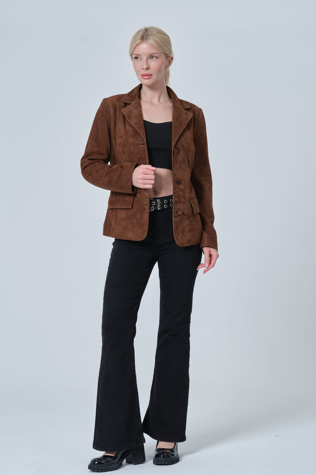 Women’s chestnut brown suede blazer jacket angled model pose