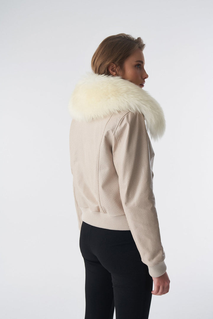 Beige bomber jacket with white fur collar