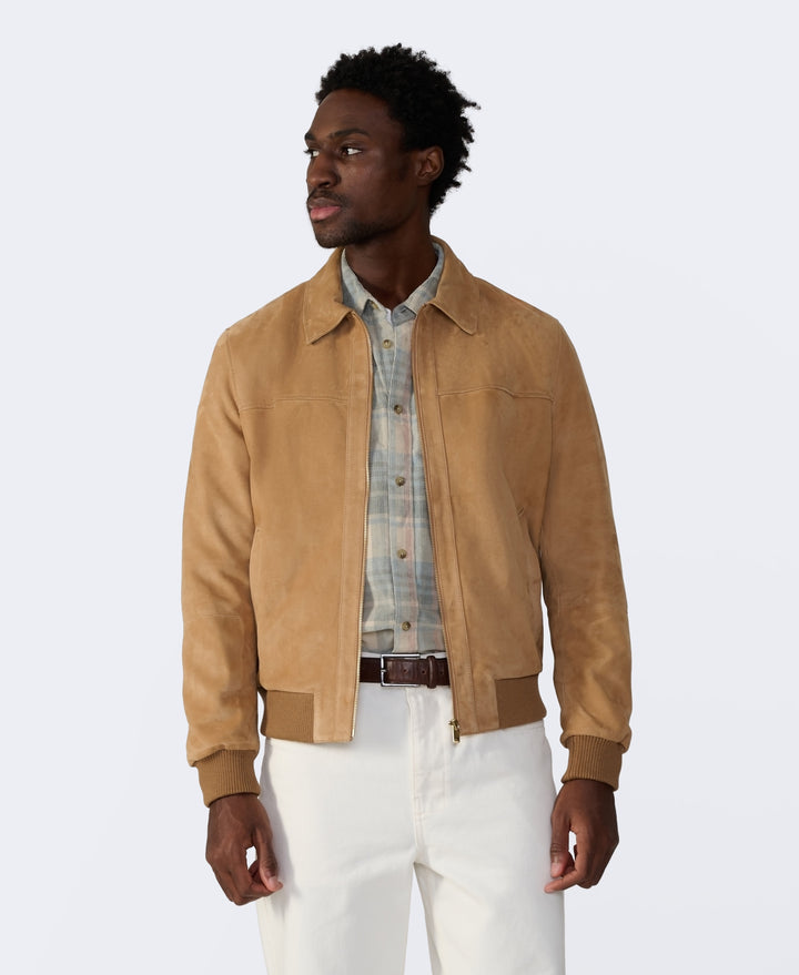 Tan suede bomber jacket on model
