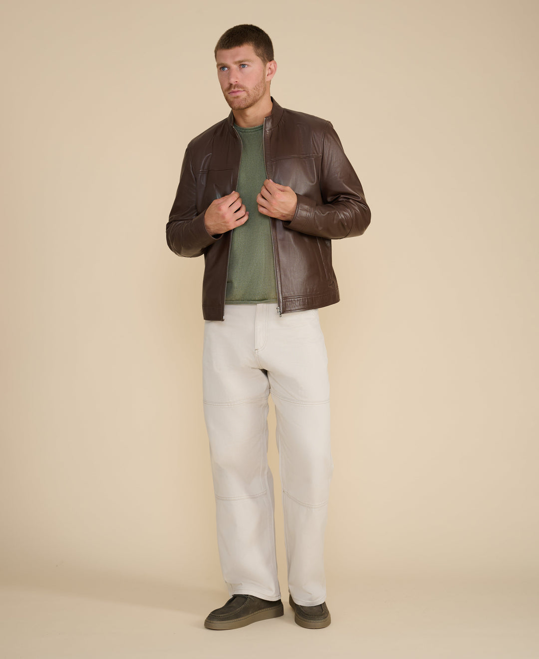 Brown leather racer jacket on model