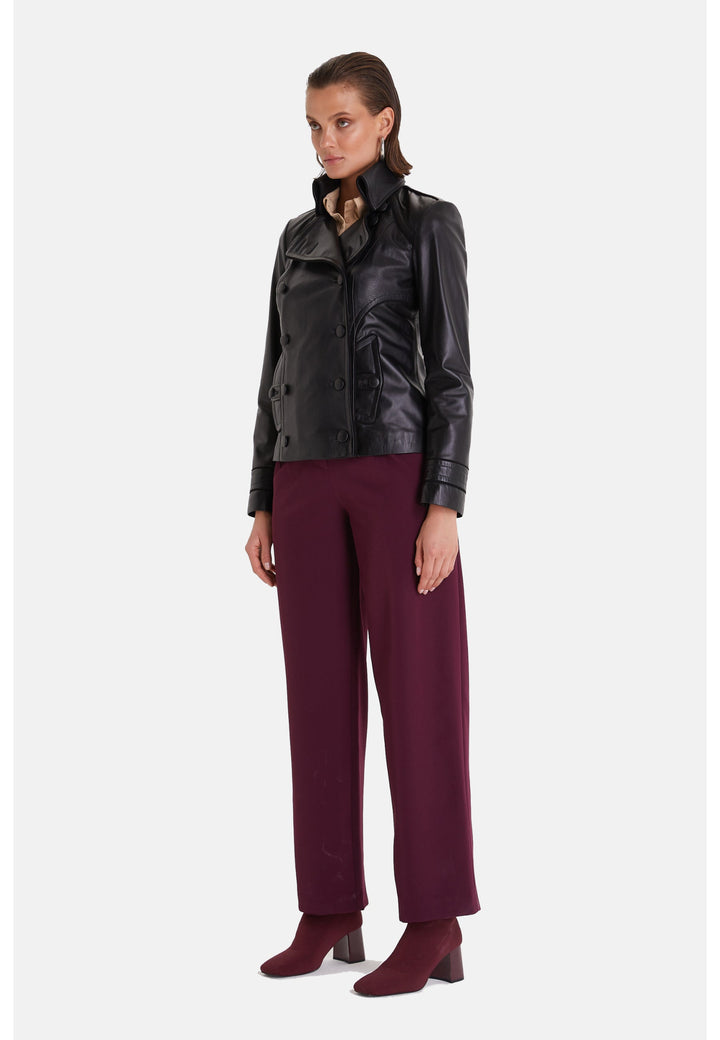 Woman wearing black leather jacket