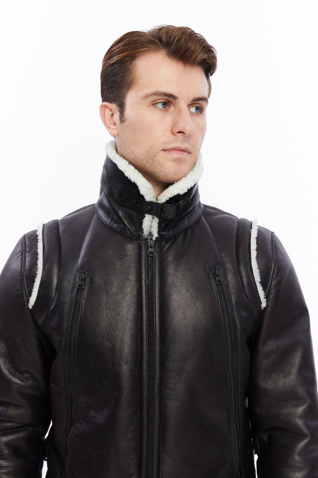 Male model wearing black shearling jacket