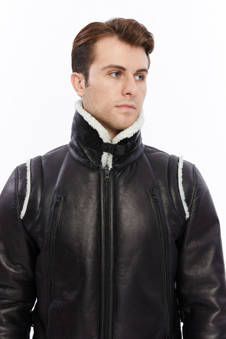 Male model wearing black shearling jacket