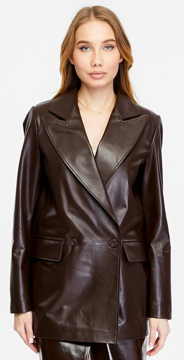 Female model in dark brown leather jacket