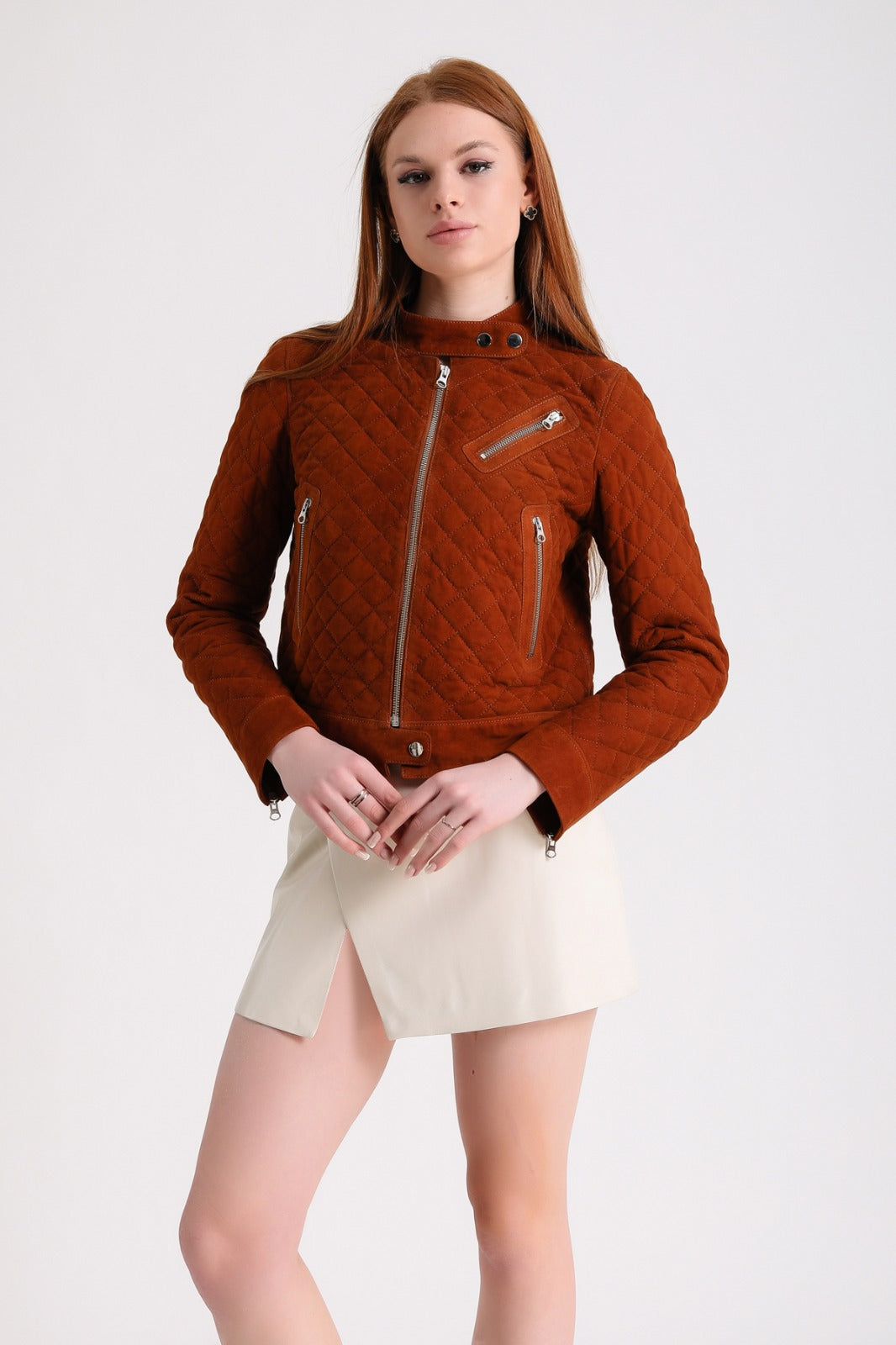 Woman wearing rust suede jacket