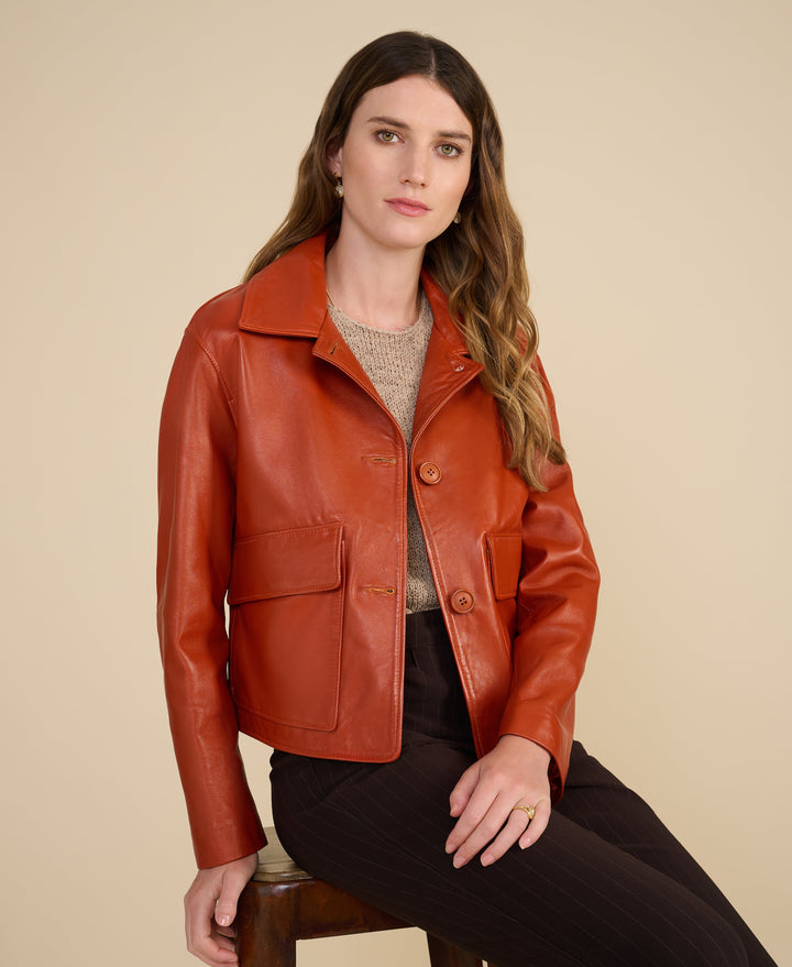 Woman wearing brown leather jacket