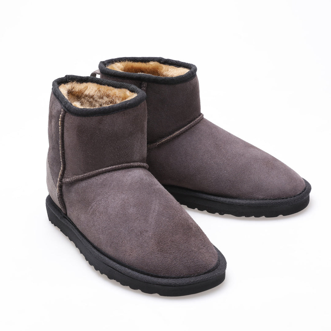 Pair of suede sheepskin ankle boots