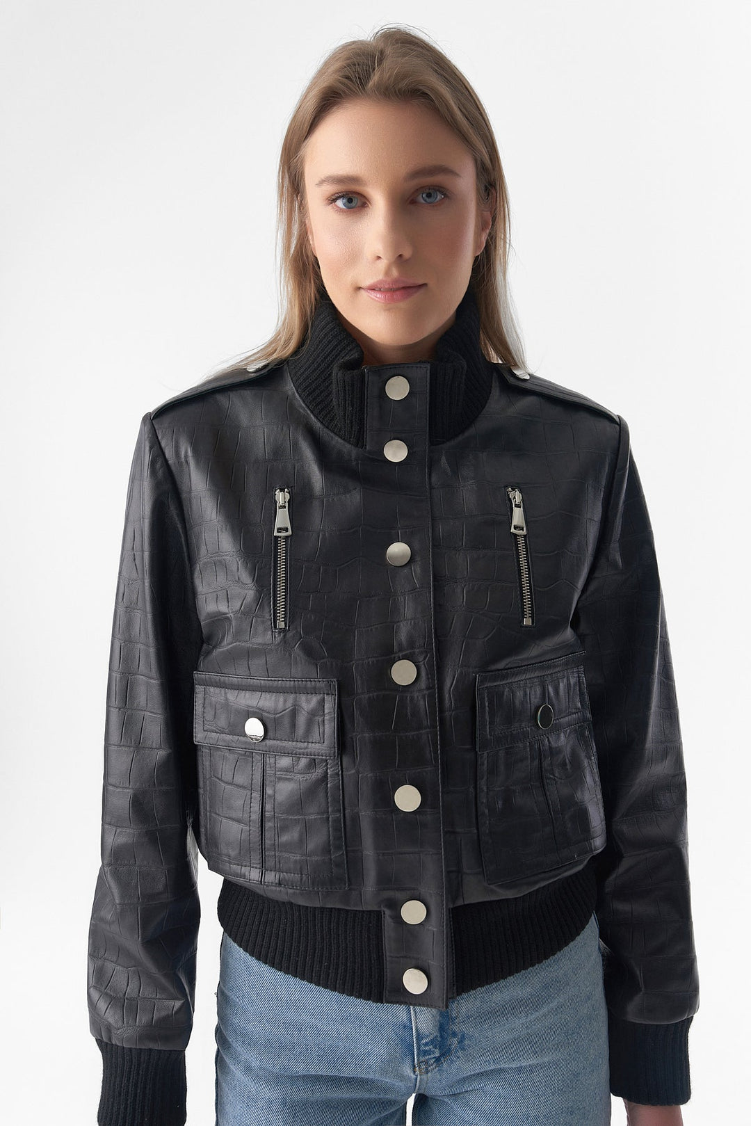 Woman wearing black leather bomber jacket