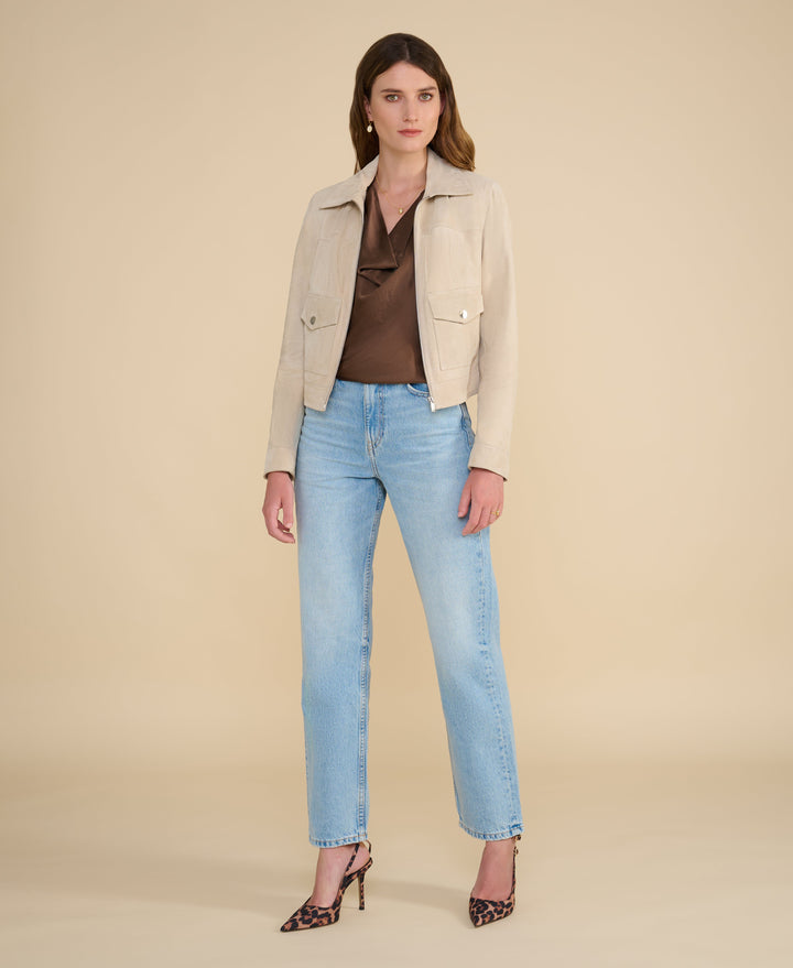 Beige suede jacket on model