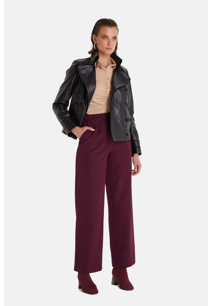 Female model wearing black leather jacket