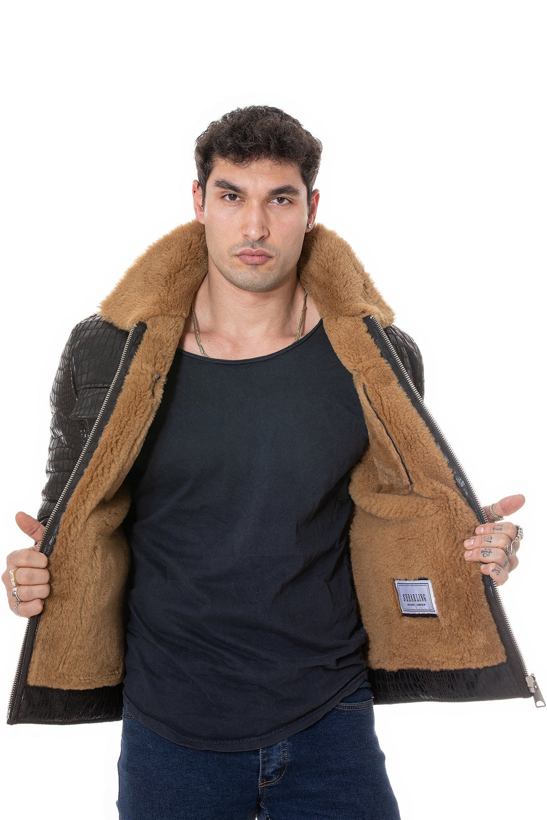 Man wearing black shearling-lined leather coat