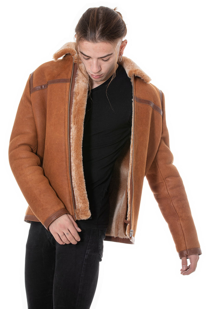 Brown shearling aviator jacket on model