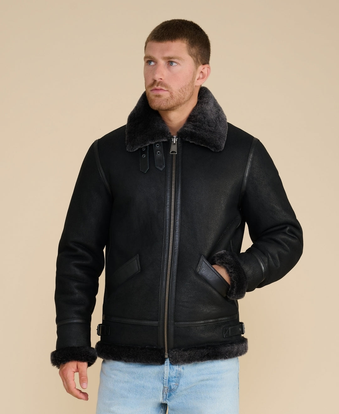 Man wearing black sheepskin aviator jacket