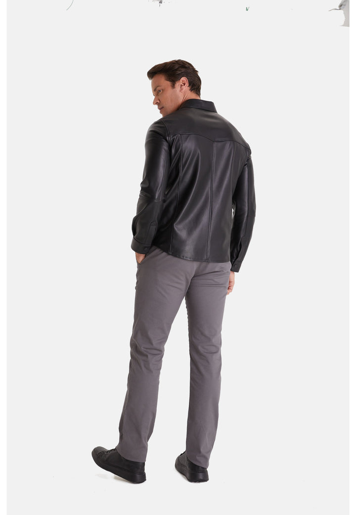 Man wearing black leather jacket back view