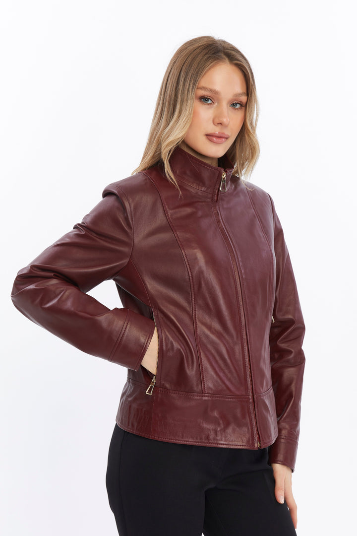 Woman wearing maroon leather jacket