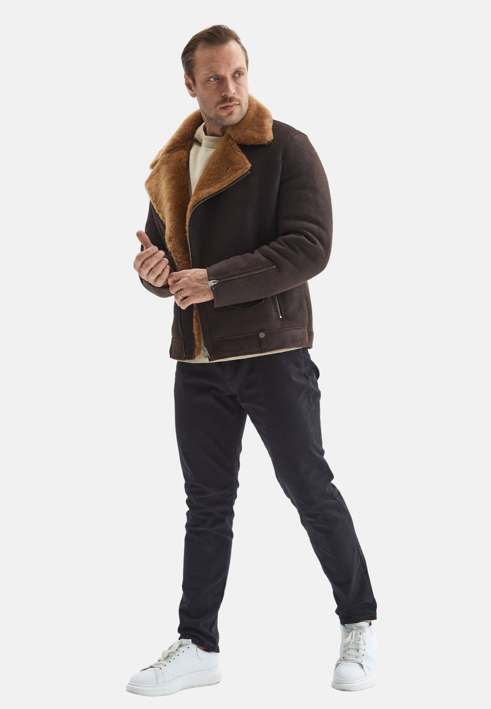Man wearing brown shearling jacket