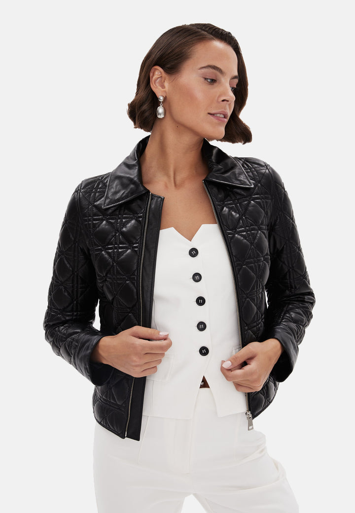 Black quilted leather jacket on model