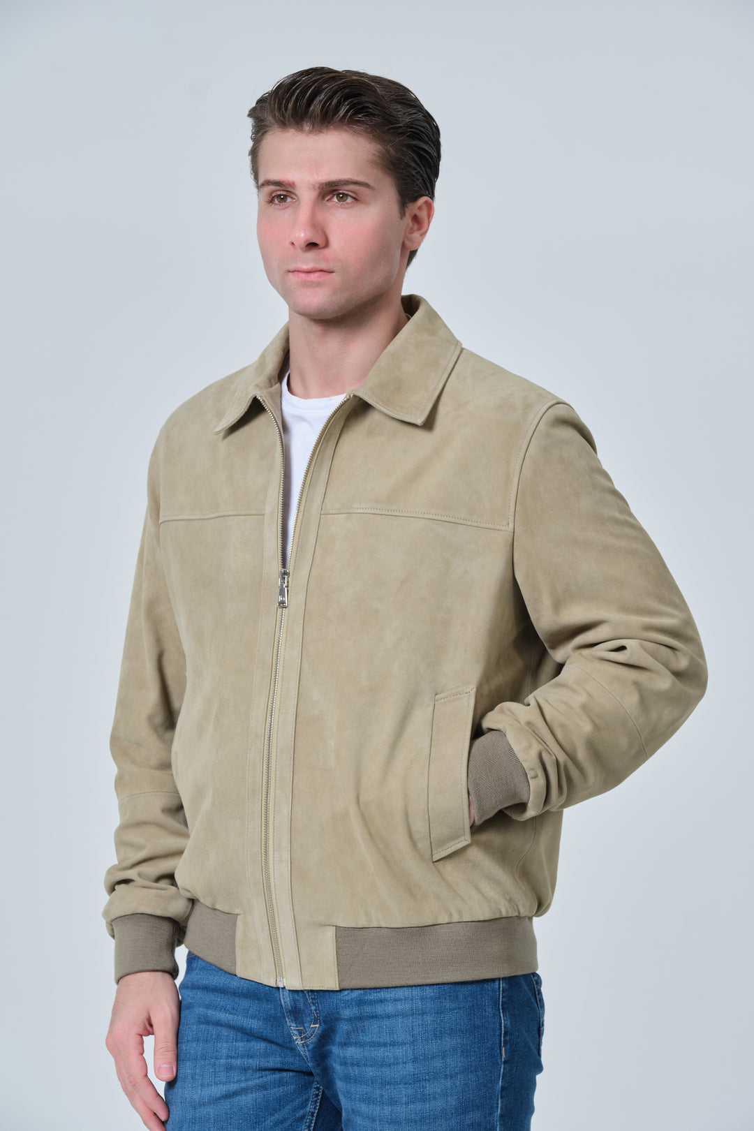 Side profile of Freddie men's sage green suede bomber jacket