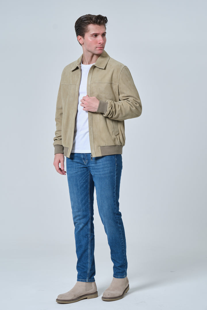 Angled view of Freddie sage green suede bomber jacket