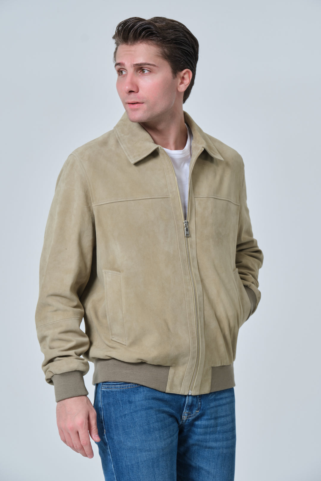 Side profile of Freddie men's sage green suede bomber jacket