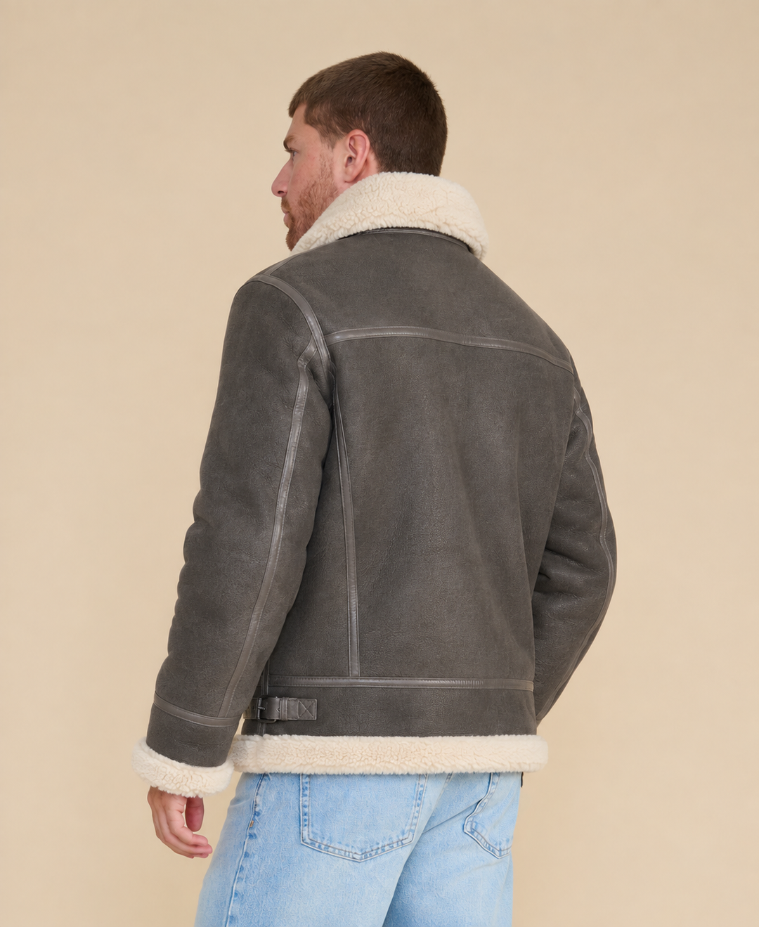 Back view of Frederick men's dark gray shearling aviator jacket with beige shearling collar