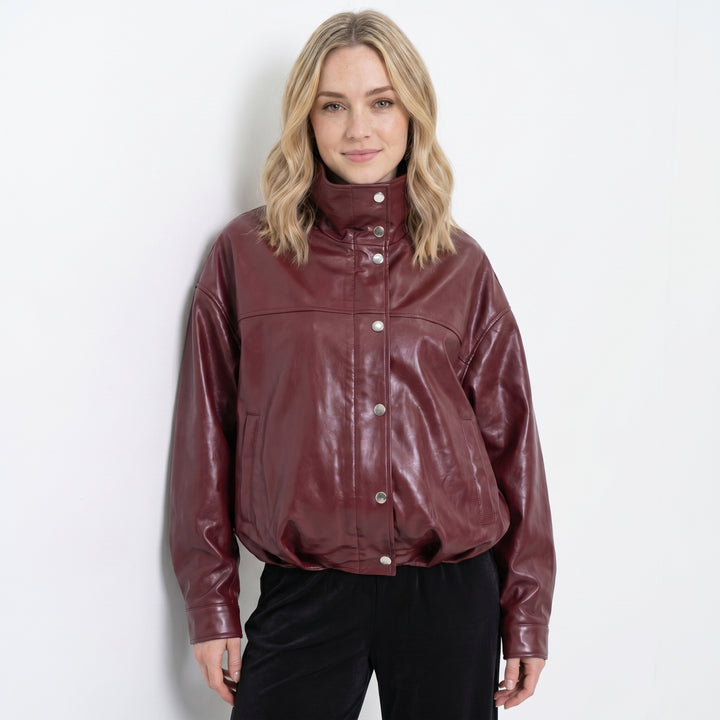 Women's burgundy nappa leather jacket front view high neck FURNIQ UK