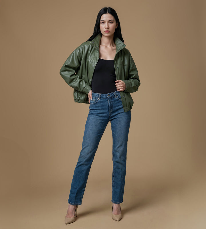 Full body look khaki leather jacket styled with denim