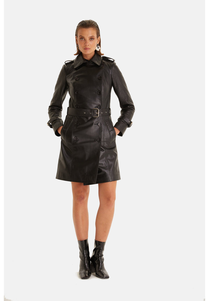 Full front view of the Greenwich black leather trench coat fastened with double-breasted buttons and a waist belt
