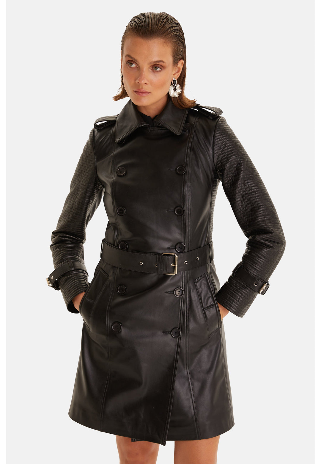 Greenwich black leather trench coat showing the belted waist, side pockets and contrasting stitched sleeves