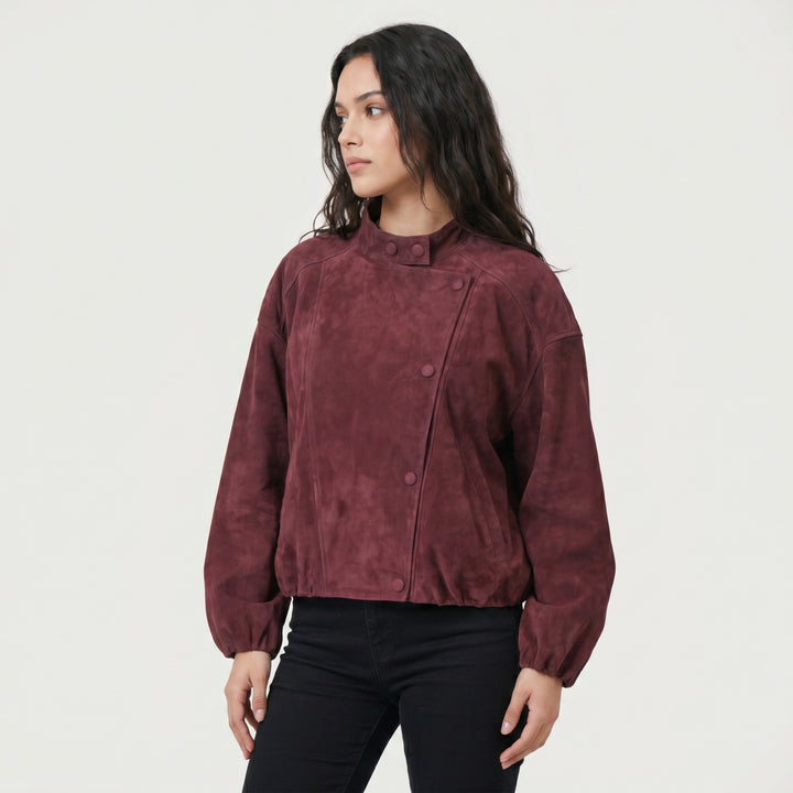 Angled view burgundy suede jacket modern silhouette