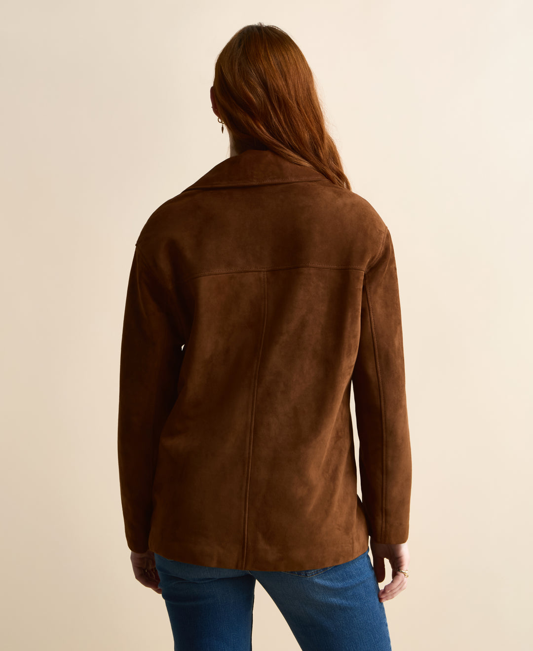 Back view of the Vera chestnut brown suede jacket showing the horizontal yoke and center seam