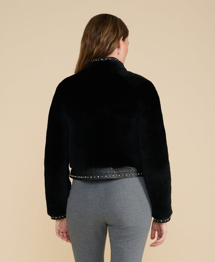 Harper black studded shearling jacket rear view premium shearling outerwear