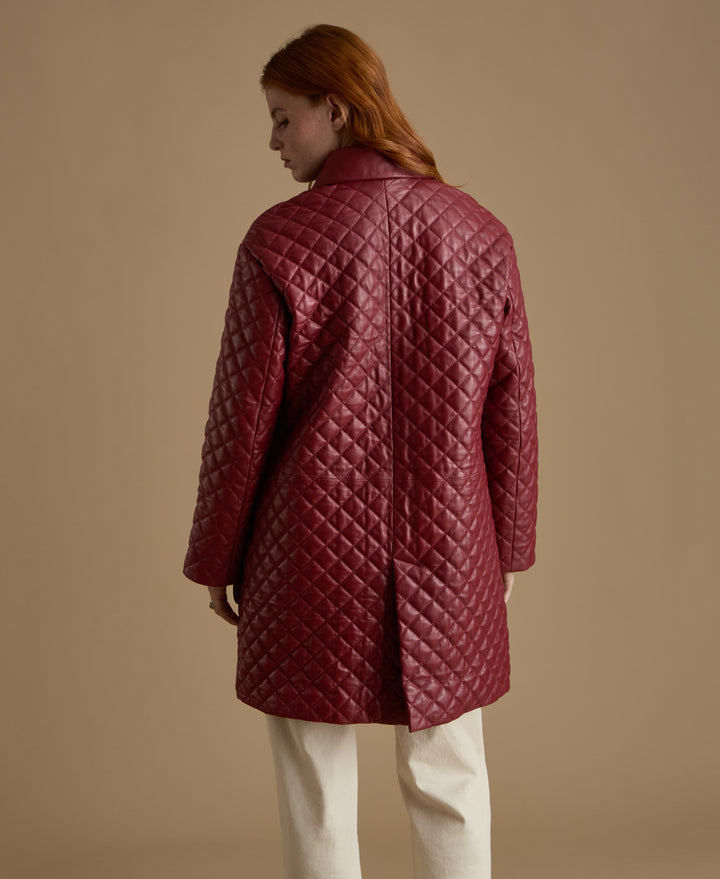 Back view of Holland light burgundy quilted leather coat with quilted diamond detailing