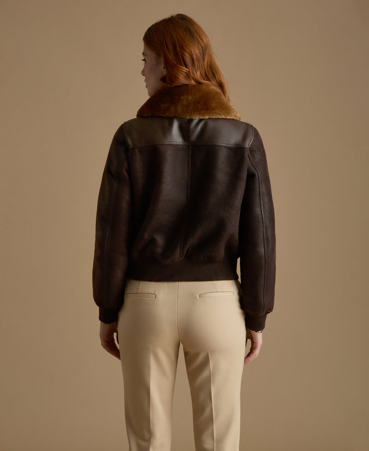 Back view of Mabel dark brown leather shearling jacket with ginger shearling collar