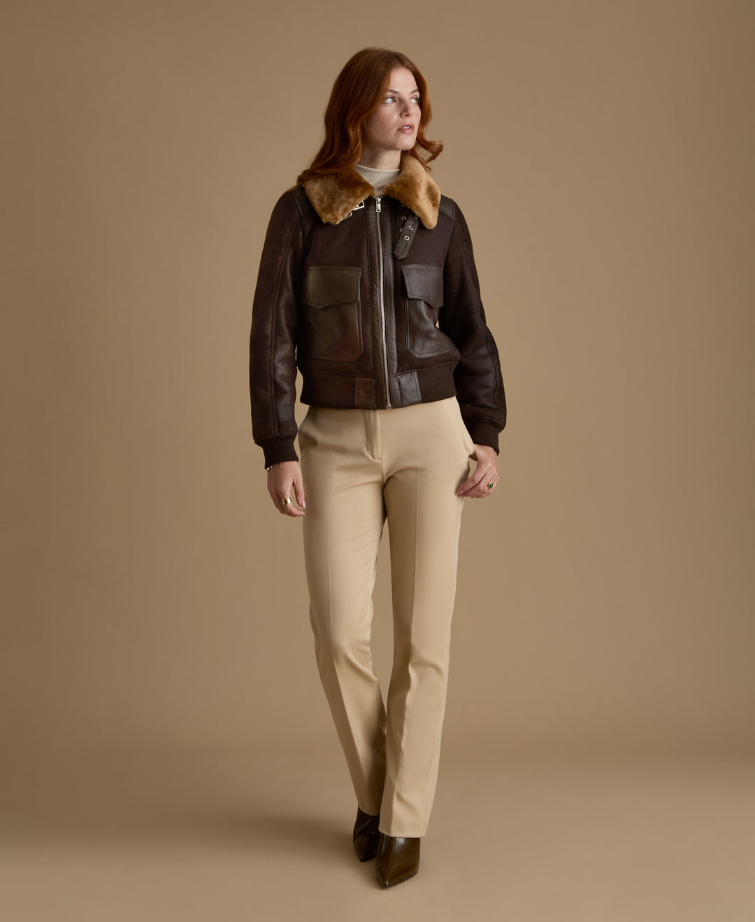 Women's Mabel genuine leather shearling jacket styled with tailored cream trousers