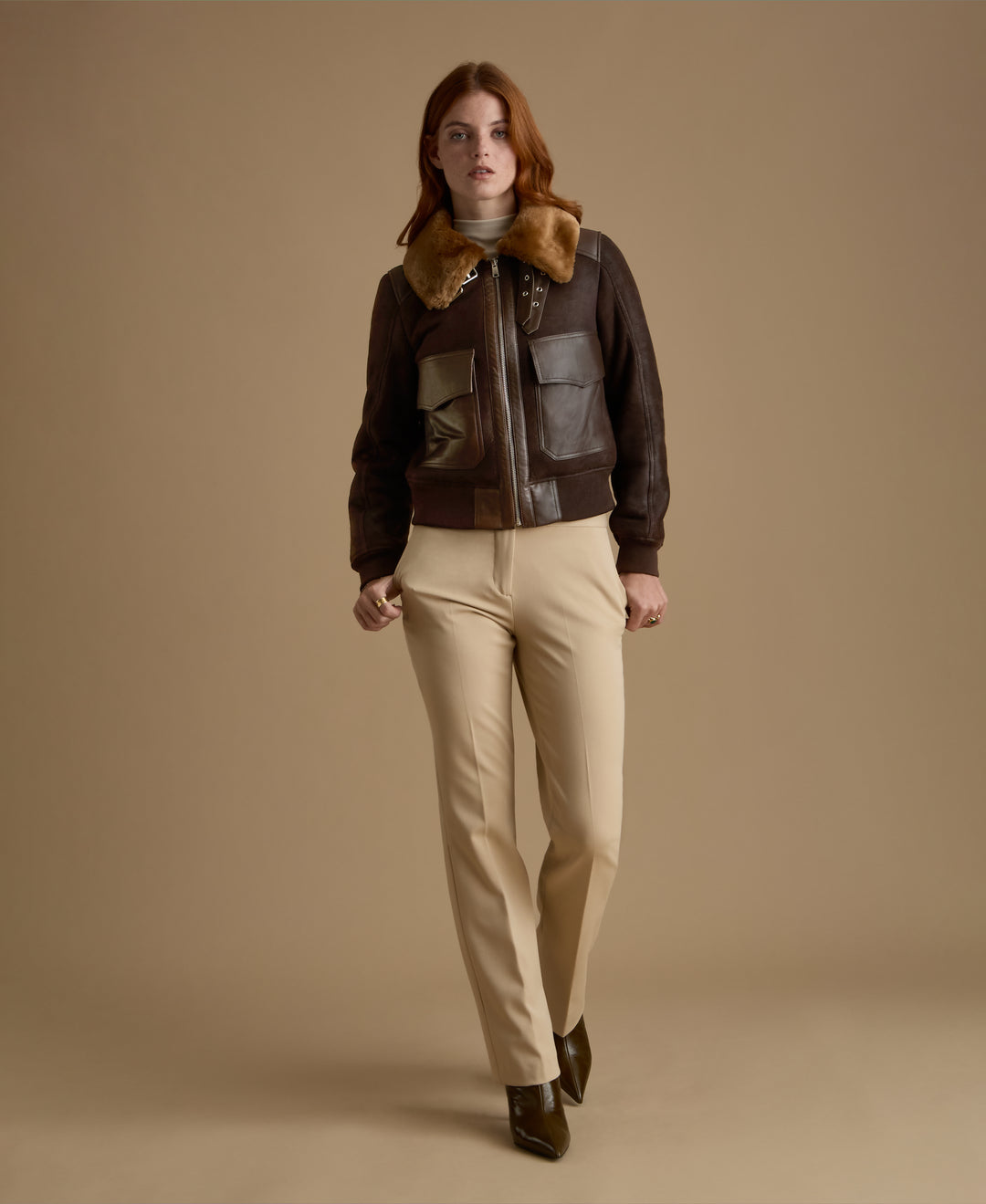 Women's Mabel genuine leather shearling jacket styled with tailored cream trousers