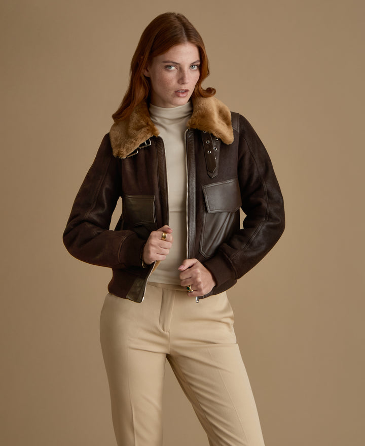 Women's Mabel dark brown leather jacket showing luxurious genuine ginger shearling lining