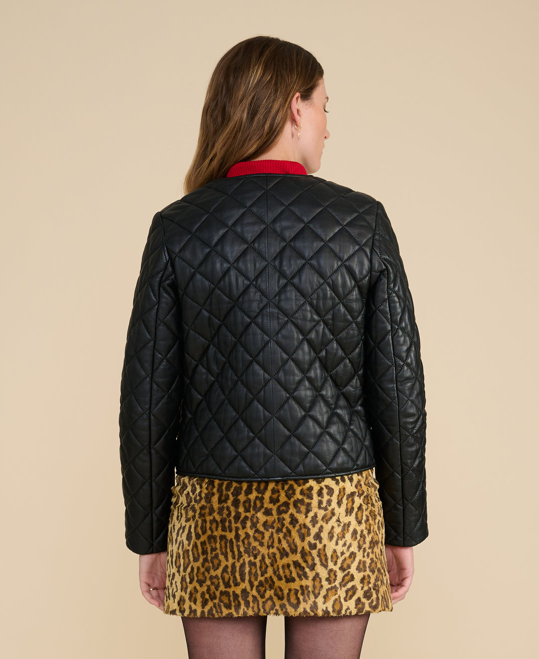 Marlowe black quilted leather jacket back view showing premium quilted construction