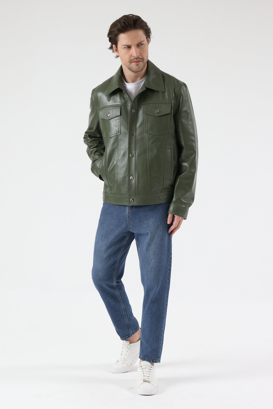 Male model wearing Oliver men's khaki nappa leather jacket with relaxed blue denim jeans
