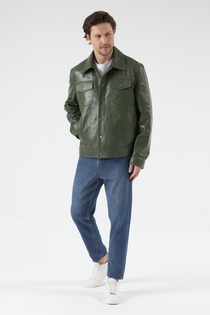 Male model wearing Oliver men's khaki nappa leather jacket with relaxed blue denim jeans