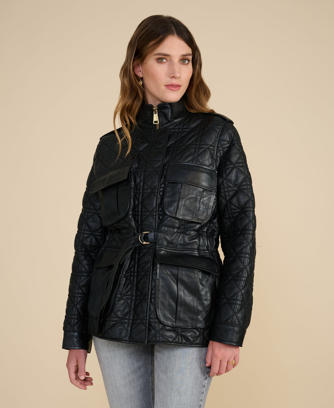 Rear view of the Reese black quilted leather field jacket highlighting quilted detailing and fitted waist