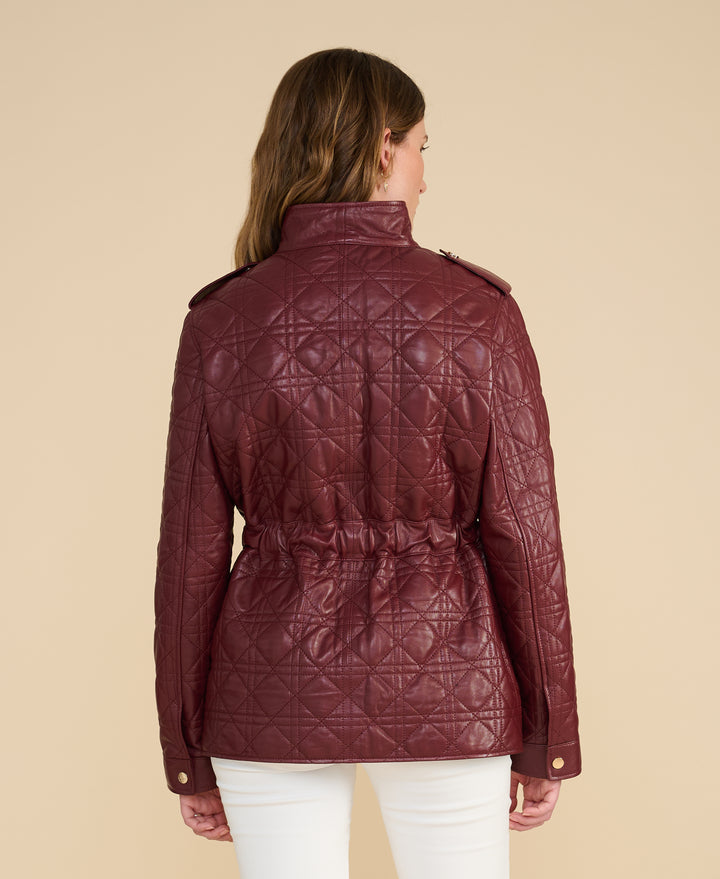 Rear view of the Reese burgundy quilted leather field jacket highlighting the quilted back and fitted waist