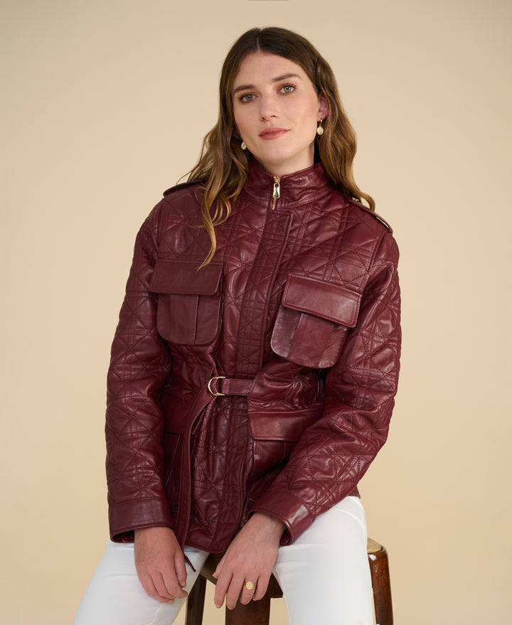 Model wearing the Reese burgundy quilted leather field jacket with utility pockets and tailored silhouette