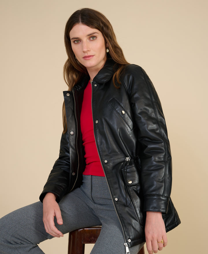Model wearing the Sheridan black leather utility jacket from the FURNIQ UK Fall Winter 2026/2027 collection