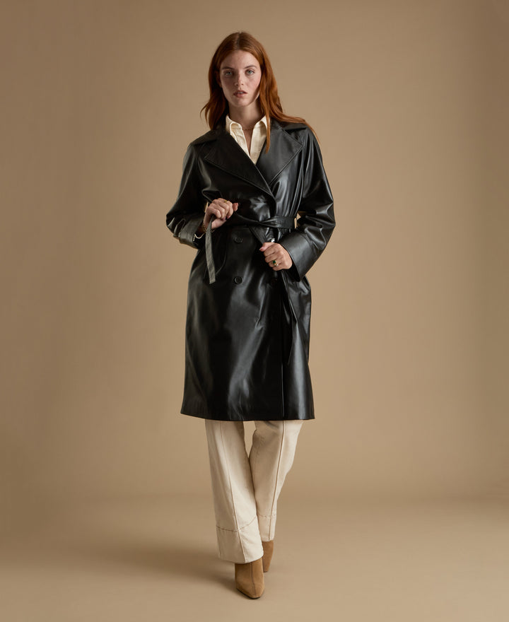 Sloane black leather trench coat full length belted leather coat walking view